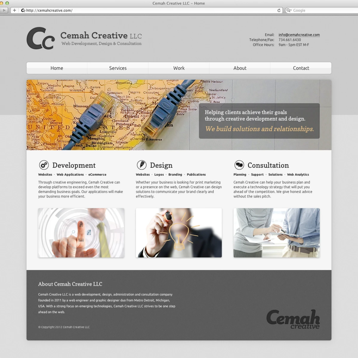 Two blue Ethernet cables plugged together lay across a vintage map of North America on the Cemah Creative LLC website homepage from 2012